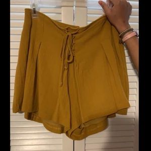 Mustard yellow boutique flowy shorts